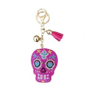 Pink rhinestone sugar skull bag charm and key chain.
